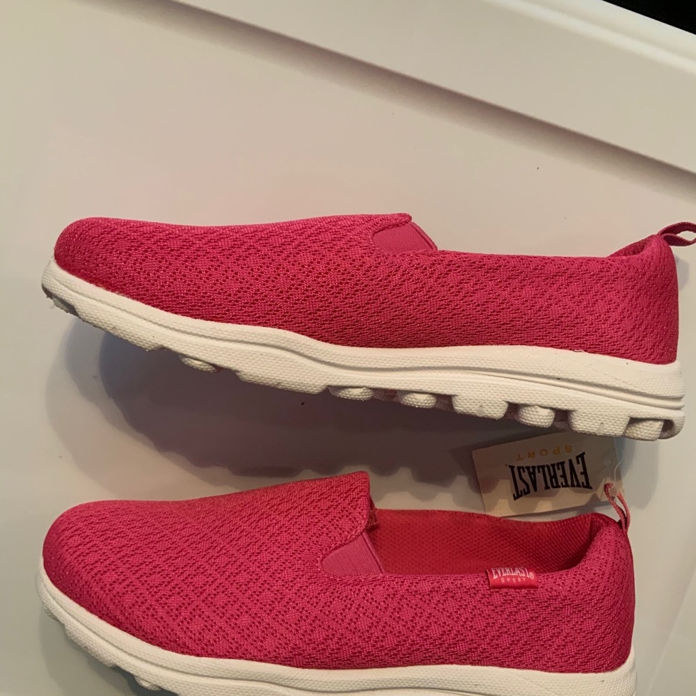 Hot pink slip-on shoes